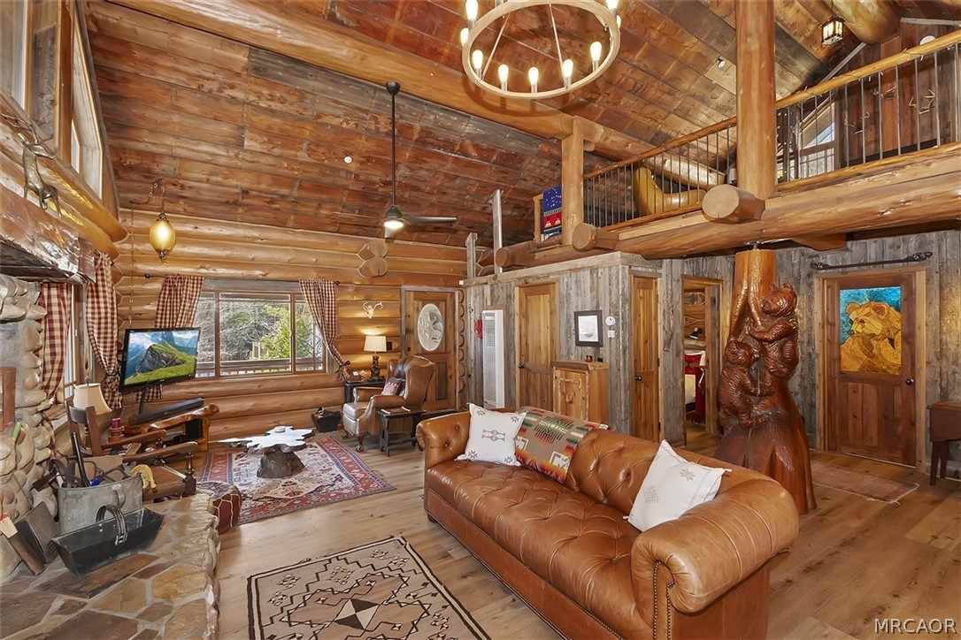 29632 Hook Creek Road Cedar Glen, CA 92321 - Photo 7 of 43 a living room with furniture a chandelier