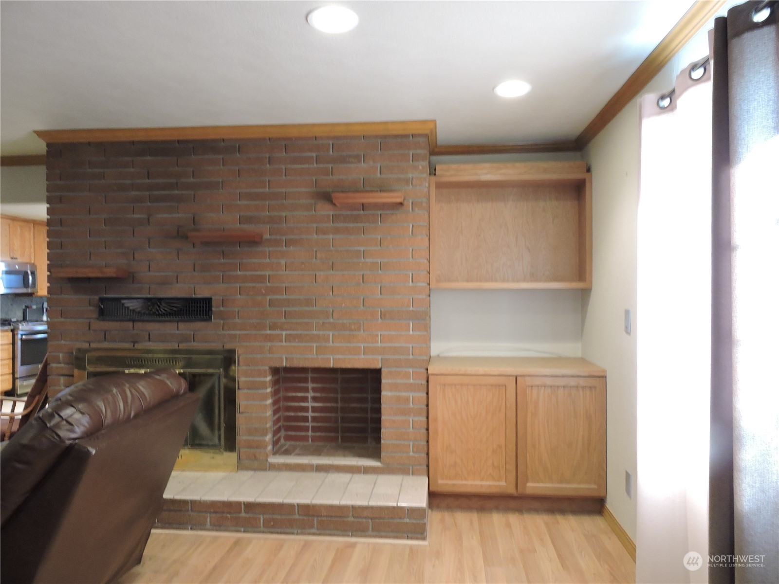 1402 Adams Road North Quincy, WA 98848 - Photo 28 of 39 a view of kitchen and empty room with wooden floor