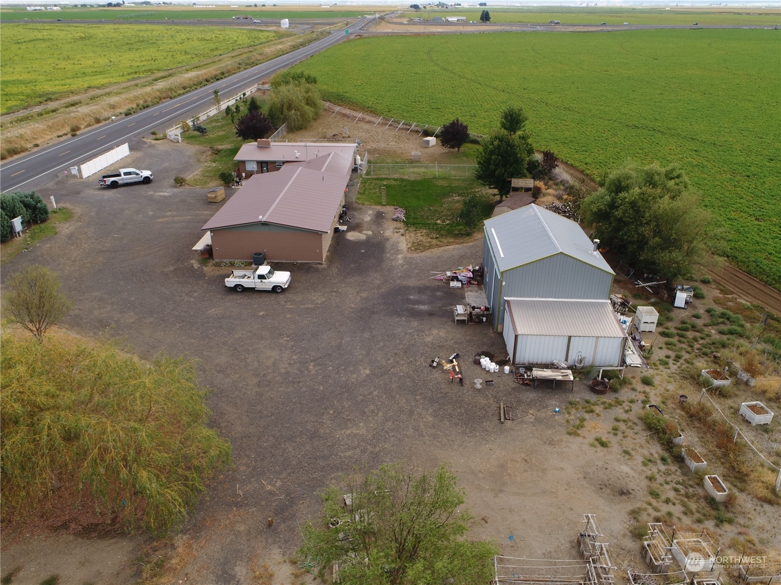 1402 Adams Road North Quincy, WA 98848 - Photo 39 of 39 an aerial view of a house with a yard and lake view