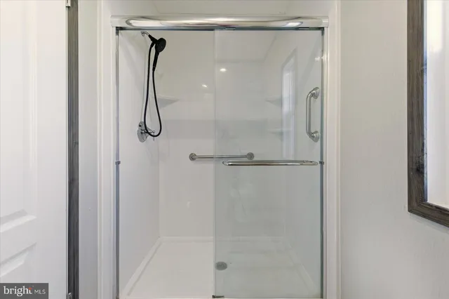 a view of a house with backyard and porch