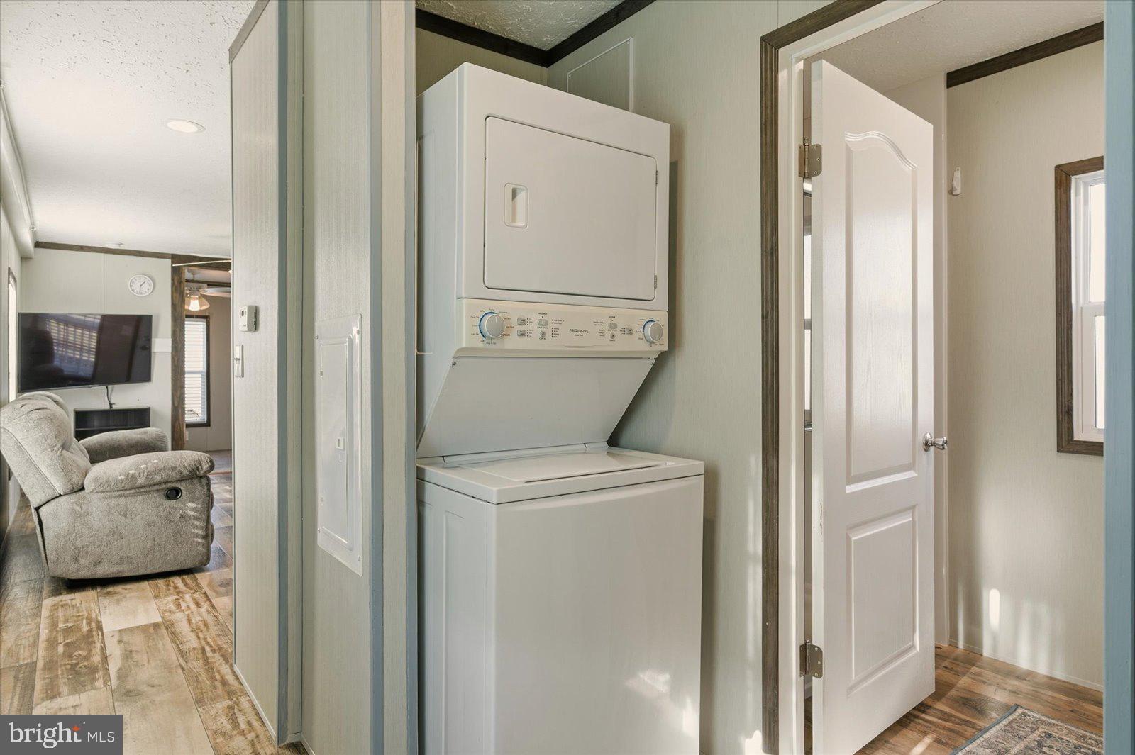 12346 Old Bridge Road, Unit 112 Ocean City, MD 21842 - Photo 33 of 72 a view of hallway with washer and dryer