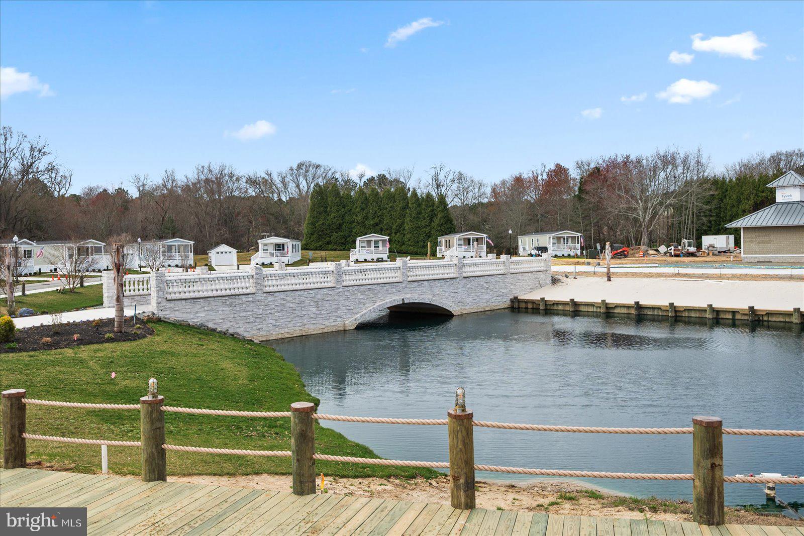 12346 Old Bridge Road, Unit 112 Ocean City, MD 21842 - Photo 55 of 72 a view of a lake with houses