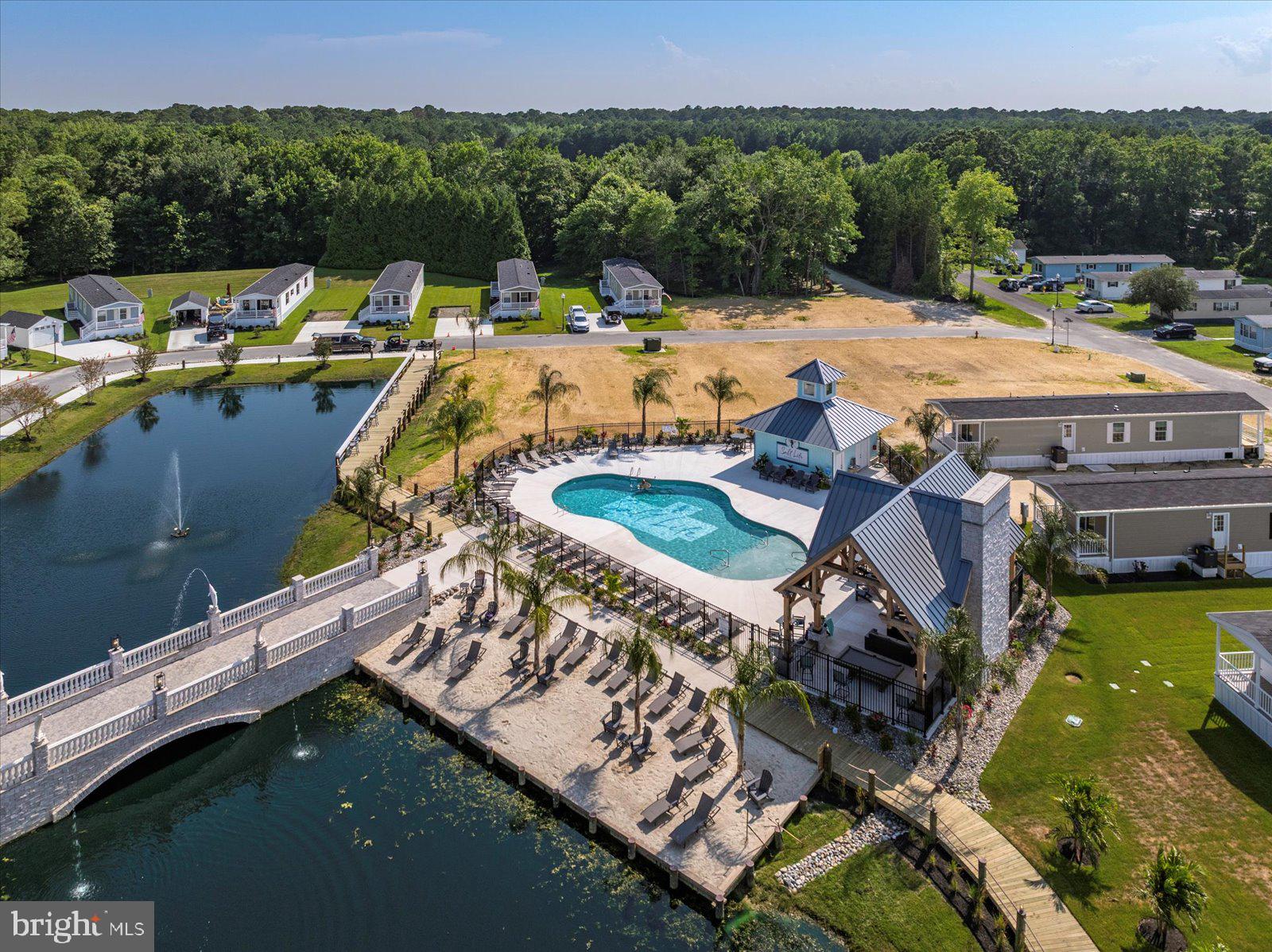 12346 Old Bridge Road, Unit 112 Ocean City, MD 21842 - Photo 68 of 72 a view of a swimming pool with a patio