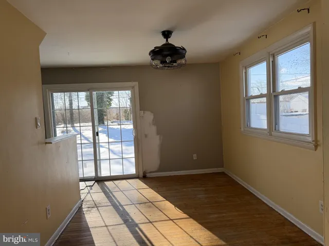 a view of an empty room and window