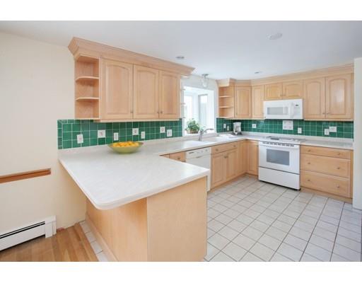 103 Page Road Lincoln, MA 01773 - Photo 12 of 12 a kitchen with a sink a stove cabinets and a window