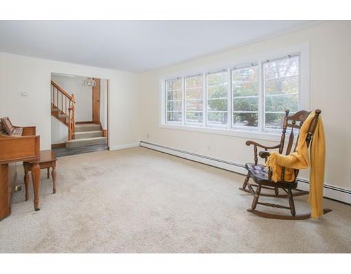 103 Page Road Lincoln, MA 01773 - Photo 9 of 12 a living room with furniture and a window