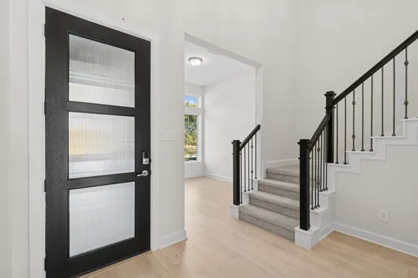 a view of entryway with stairs