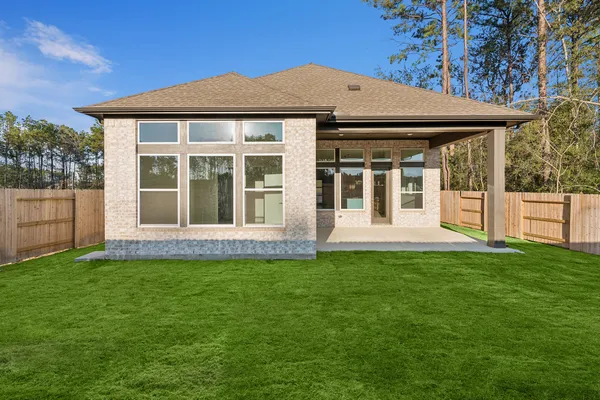 a view of a house with a garden