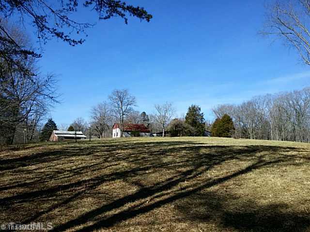 1200 John Harger Road Walnut Cove, NC 27052 - Photo 12 of 16 Land. Looking back to workshop and cabin from bottom field and stream area