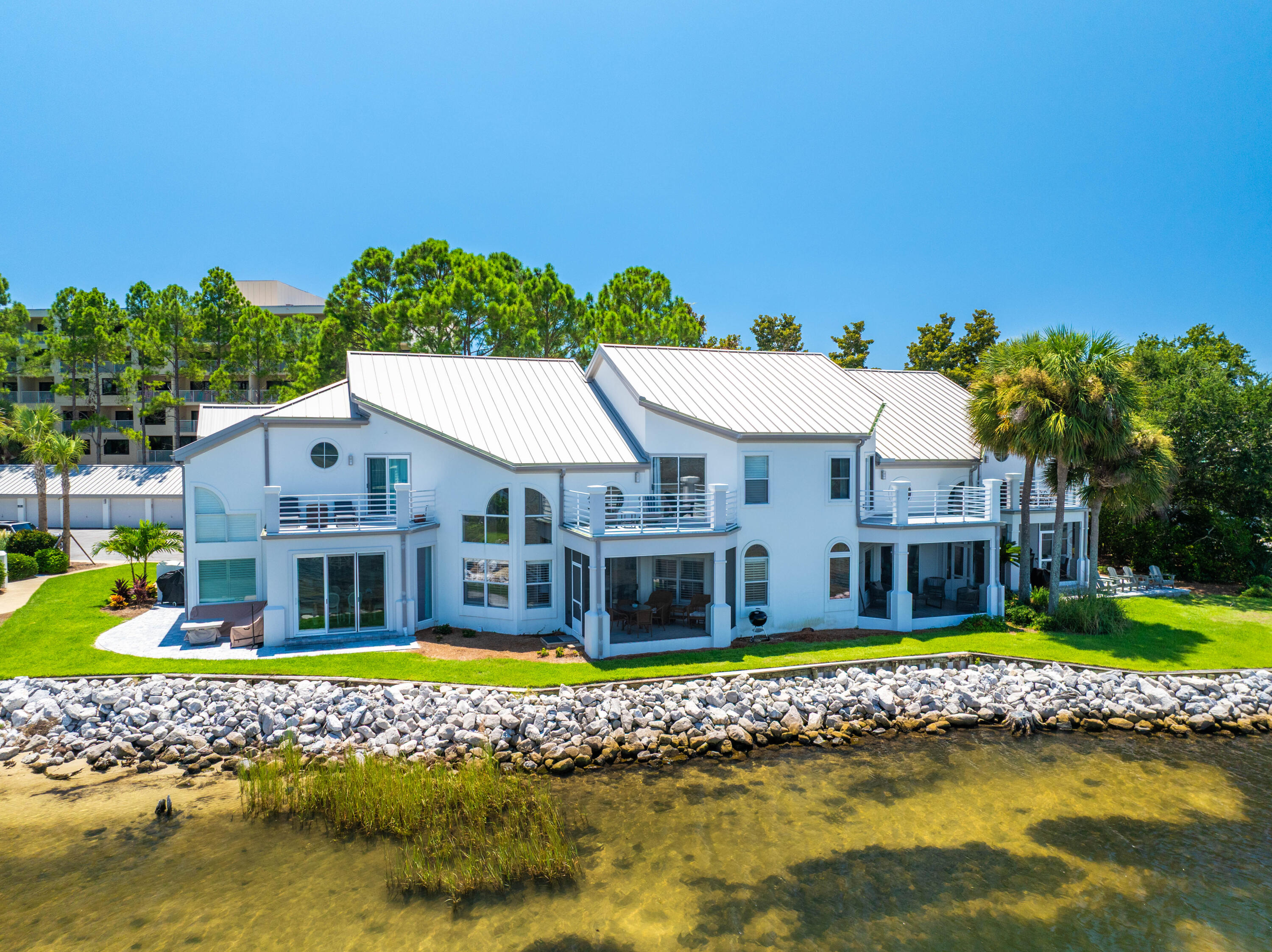 a front view of a house with a swimming pool