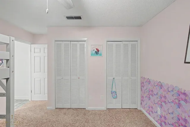 an empty room with closet