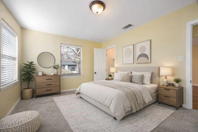 a bedroom with a bed and furniture