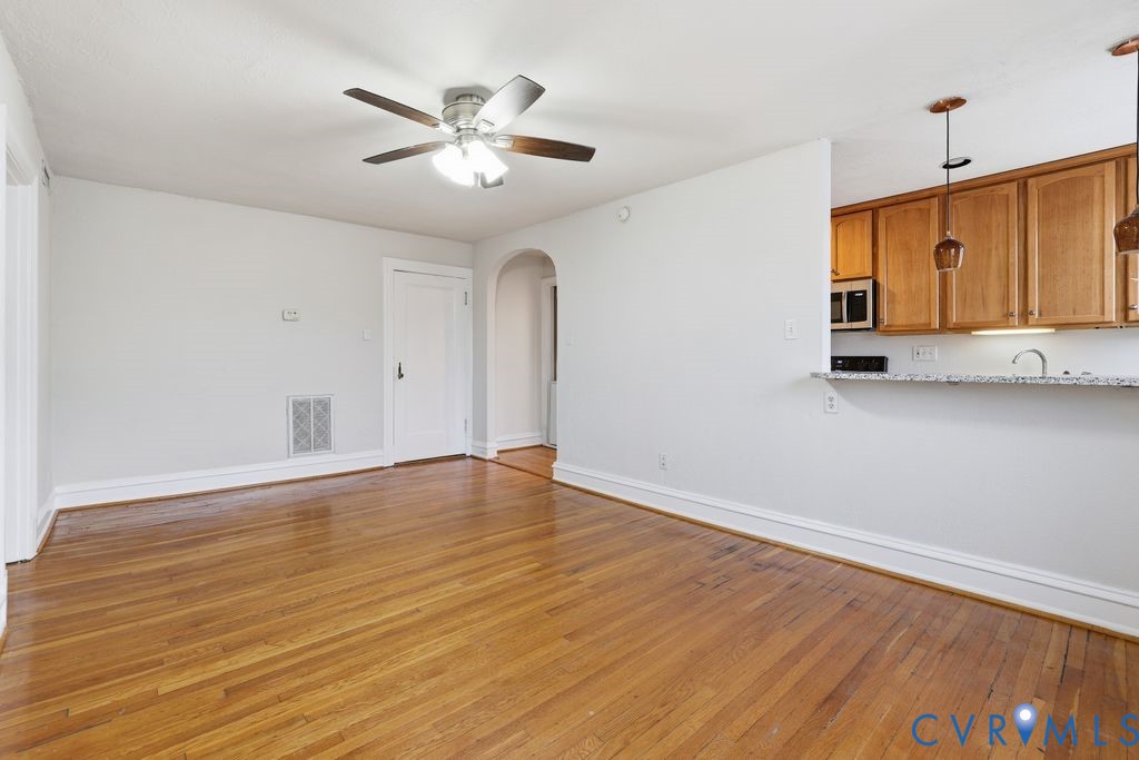 1112 Roseneath Road, Unit U9 Richmond, VA 23230 - Photo 2 of 10 Unfurnished living room featuring light wood finis