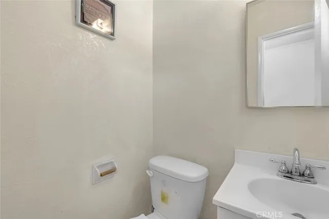 a bedroom with a bed and a walk in closet