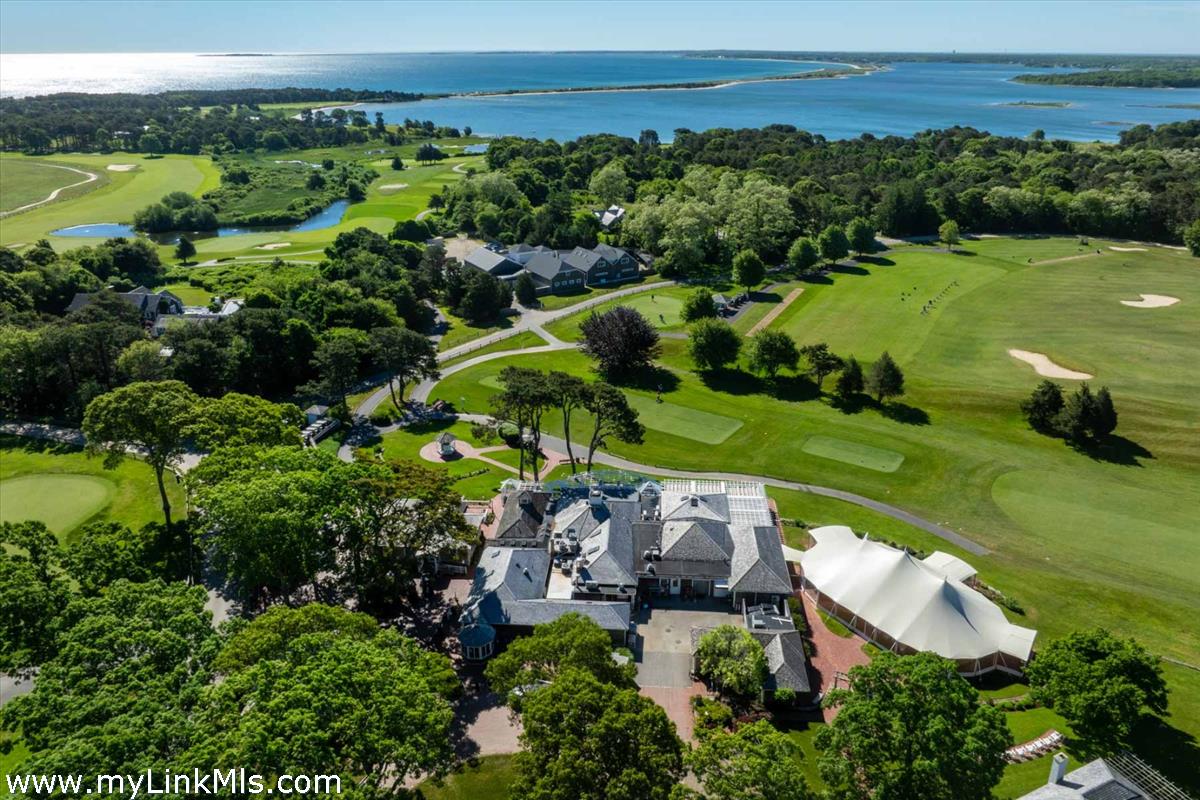 7 Overview Lane Oak Bluffs, MA 02557 - Photo 4 of 14 an aerial view of a house with a garden and lake view