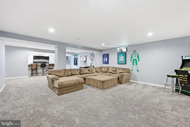 a living room with furniture and a table