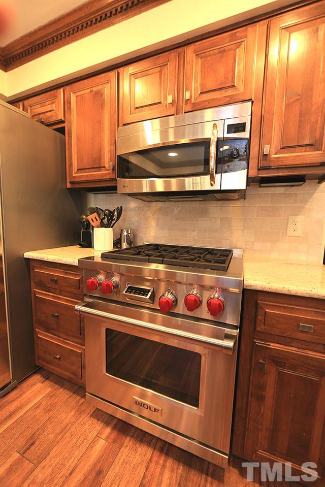 100 Sturbridge Road Raleigh, NC 27615 - Photo 6 of 17 Sellers connected home to gas just to install this amazing range!