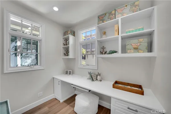 a bathroom with a sink and a window