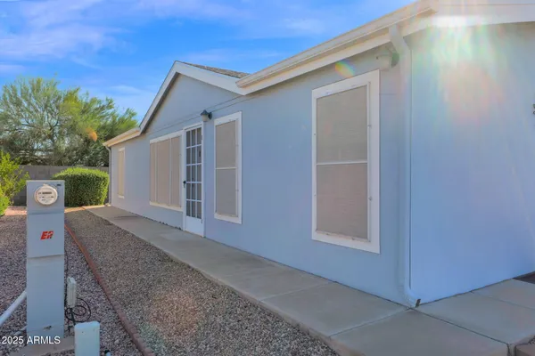a view of front door and yard