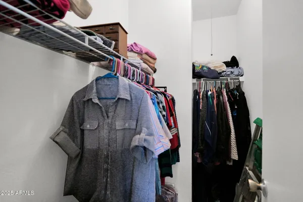 a close up view of a walk in closet