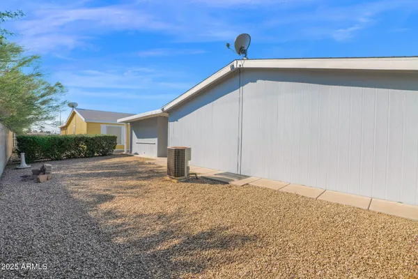 a house with trees in the background