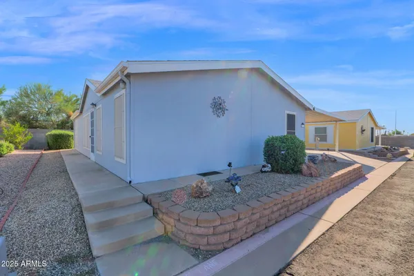 a house view with a backyard space