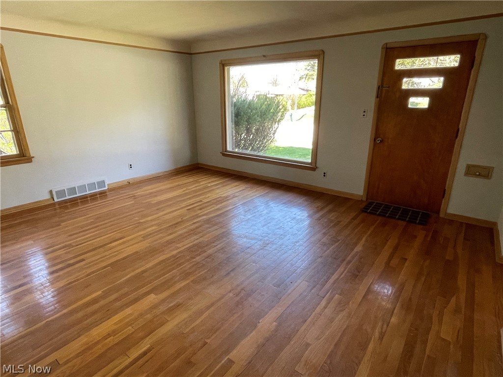 24800 Emery Road Warrensville Heights, OH 44128 - Photo 4 of 17 Family room looking toward the front entrance