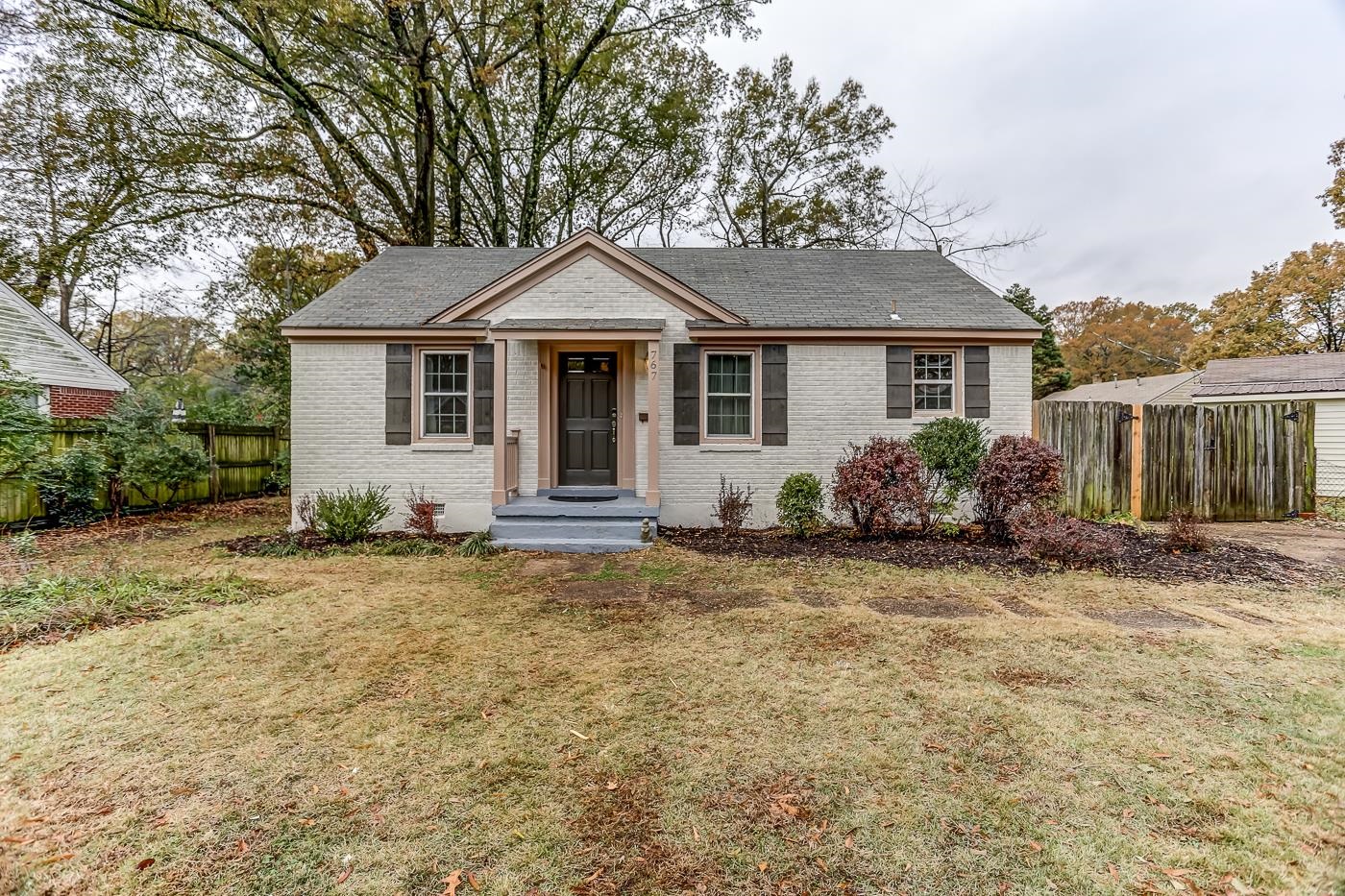 767 Berry Road Memphis, TN 38117 - Photo 2 of 16 front view of a house with a yard