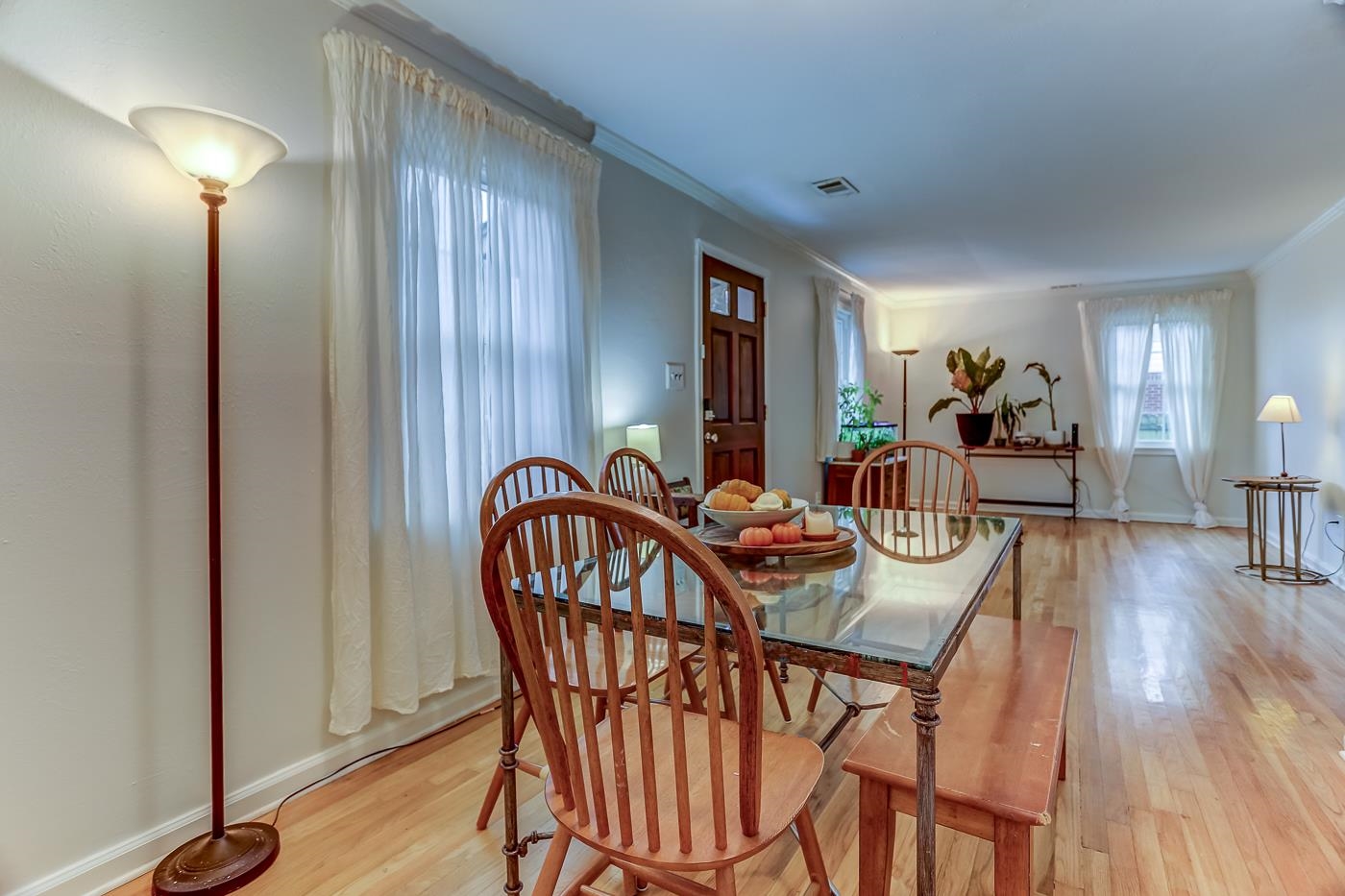 767 Berry Road Memphis, TN 38117 - Photo 5 of 16 a view of a dining room with furniture and wooden floor