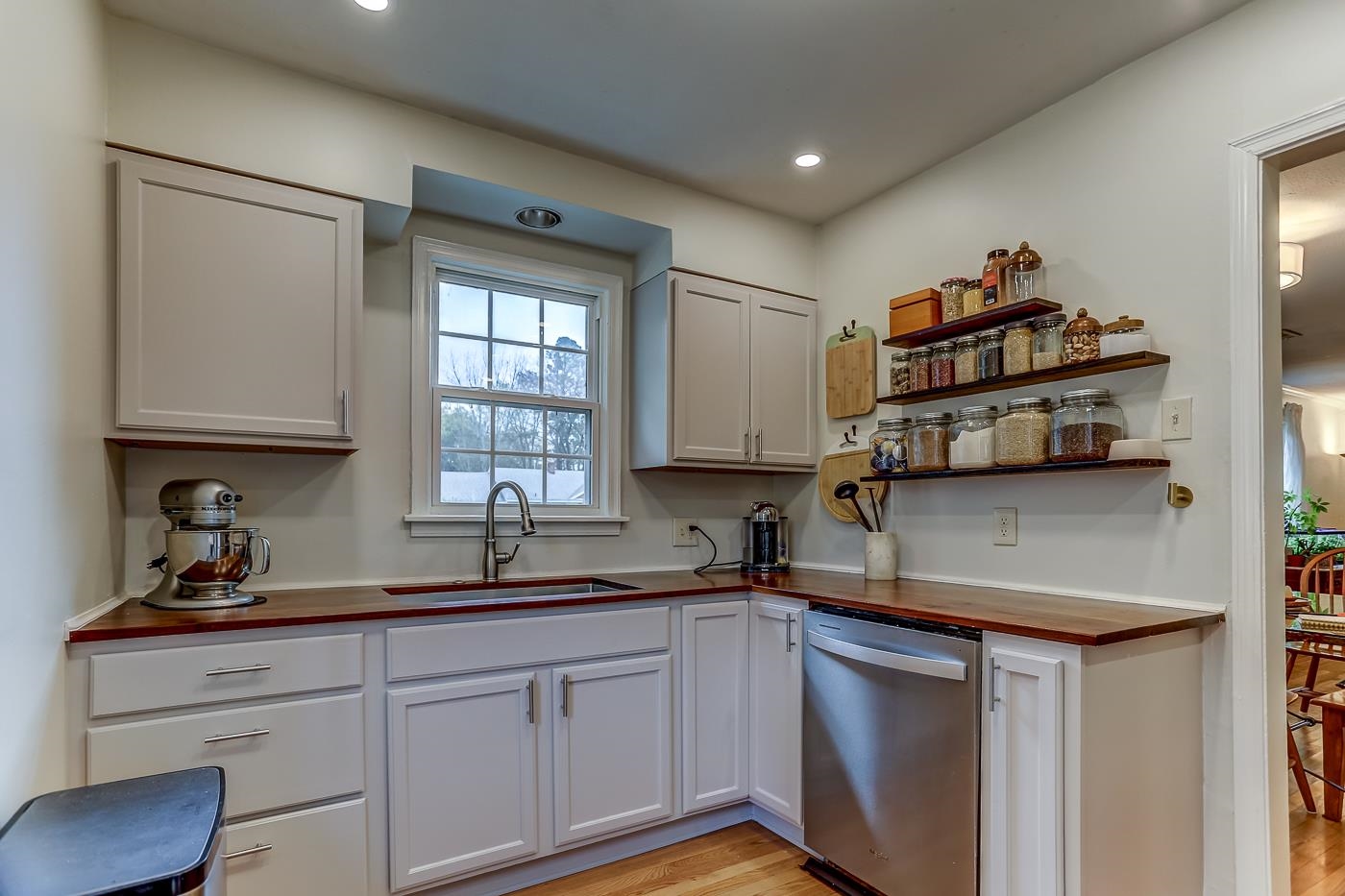767 Berry Road Memphis, TN 38117 - Photo 7 of 16 a kitchen with stainless steel appliances granite countertop a sink stove and cabinets