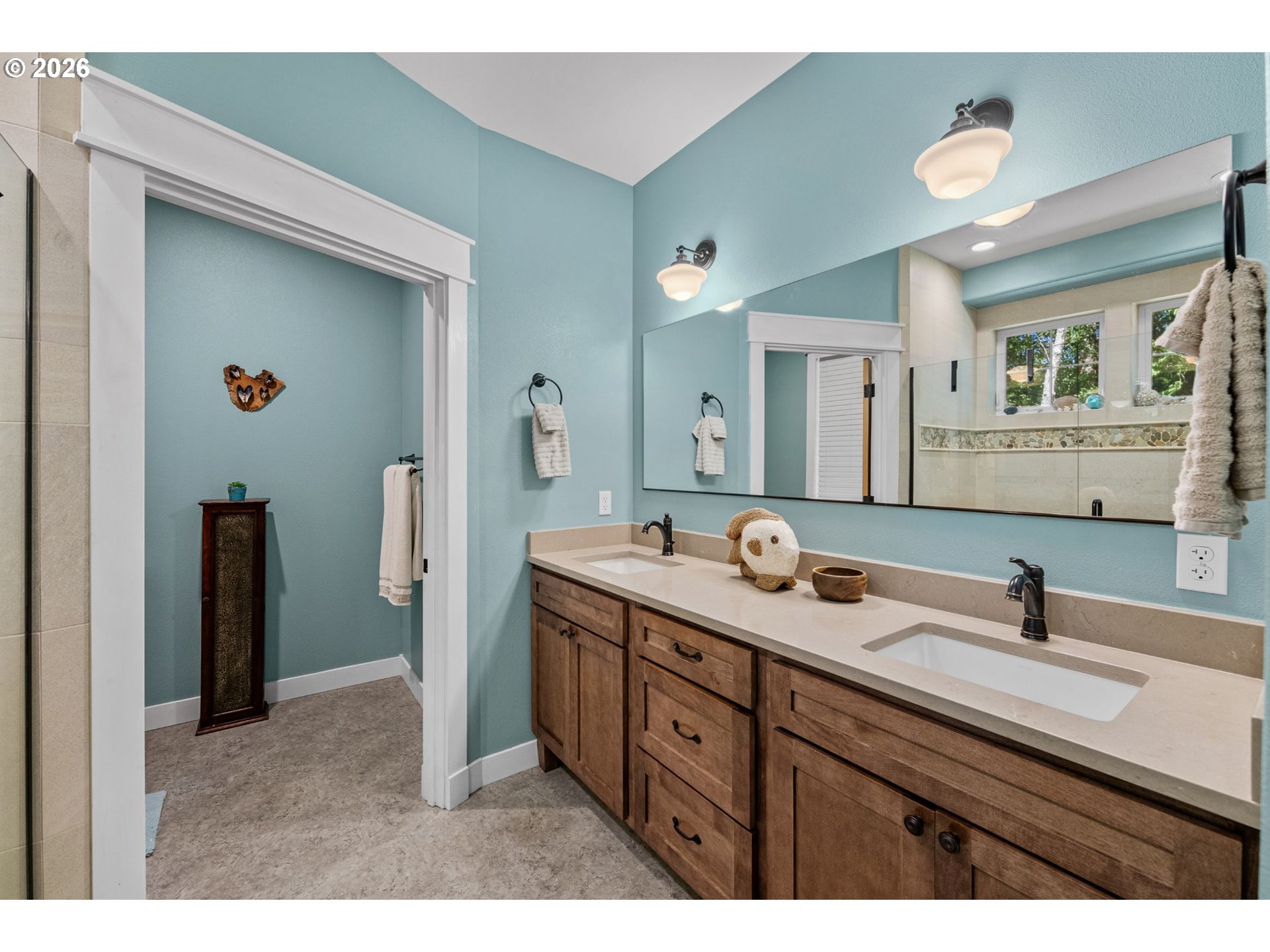 41900 Park Road Port Orford, OR 97465 - Photo 22 of 48 a bathroom with a double vanity sink and a mirror