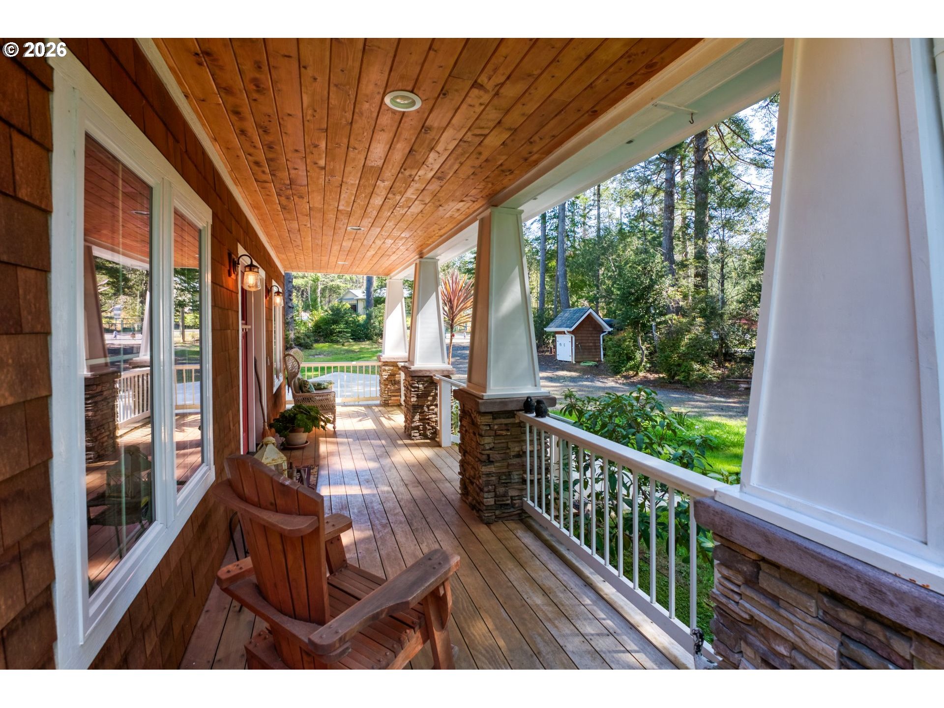41900 Park Road Port Orford, OR 97465 - Photo 30 of 48 a view of a porch with wooden floor and outdoor space
