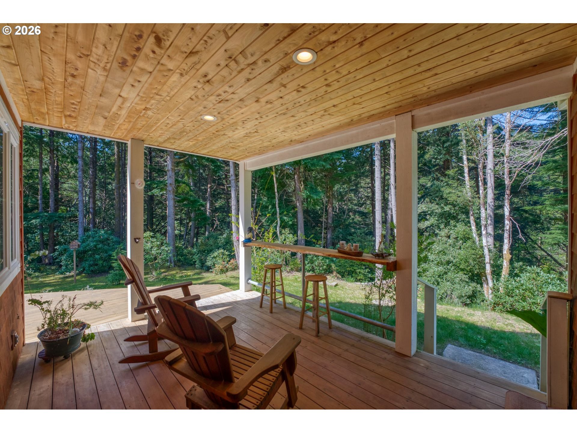 41900 Park Road Port Orford, OR 97465 - Photo 32 of 48 a house view with a sitting space and garden view