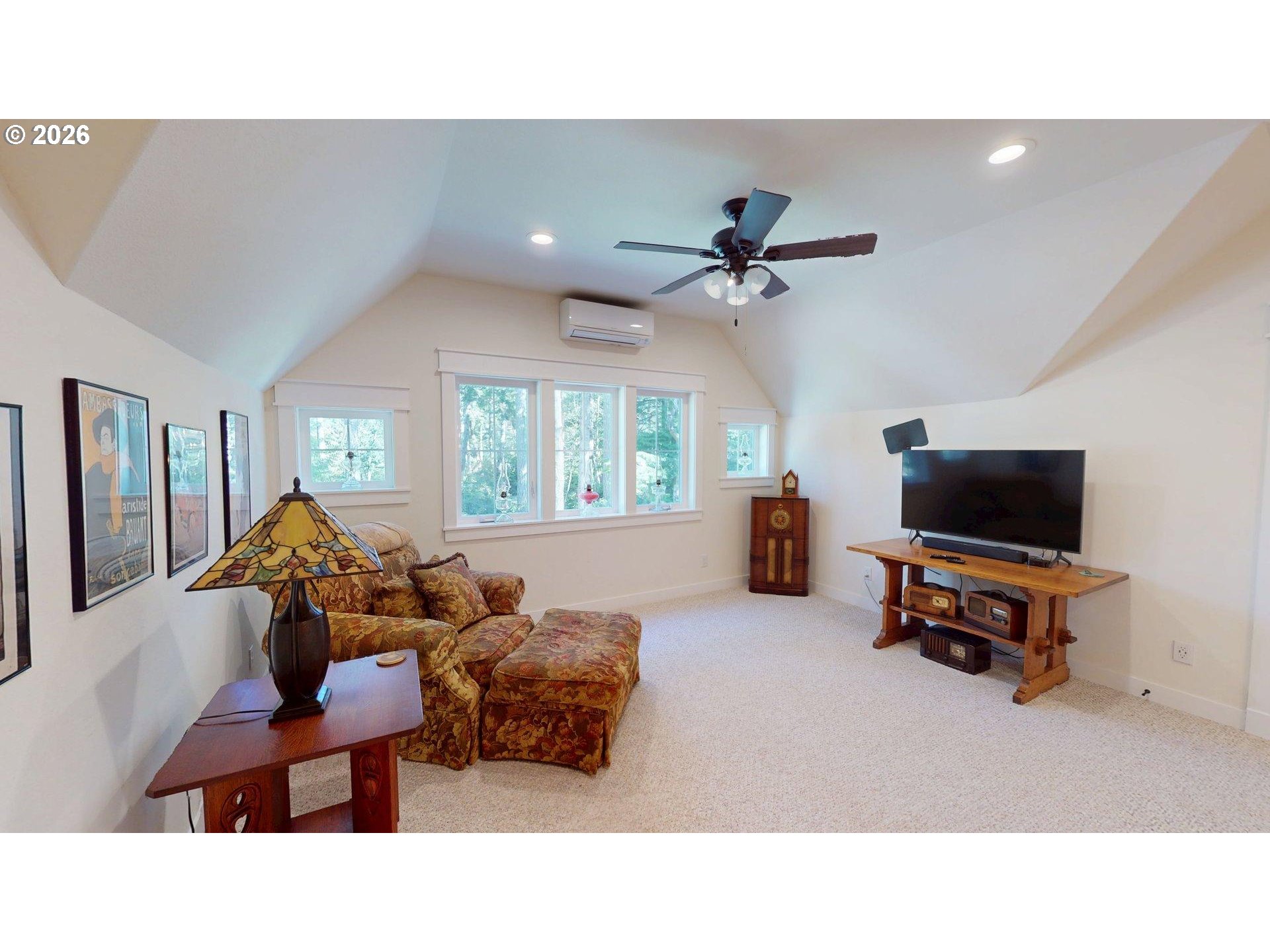 41900 Park Road Port Orford, OR 97465 - Photo 42 of 48 a living room with furniture and a flat screen tv