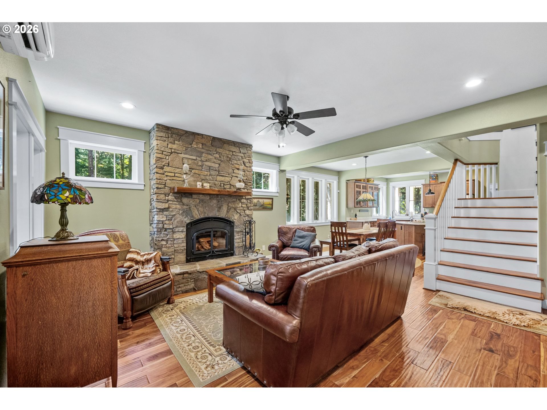 41900 Park Road Port Orford, OR 97465 - Photo 5 of 48 a living room with furniture a fireplace and a ceiling fan