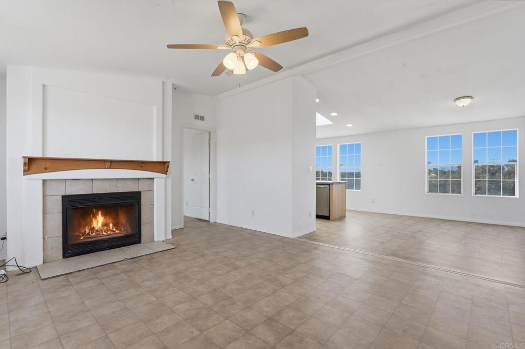909 Tierra De Luna Road Boulevard, CA 91905 - Photo 26 of 74 a view of an empty room with a fireplace and a window