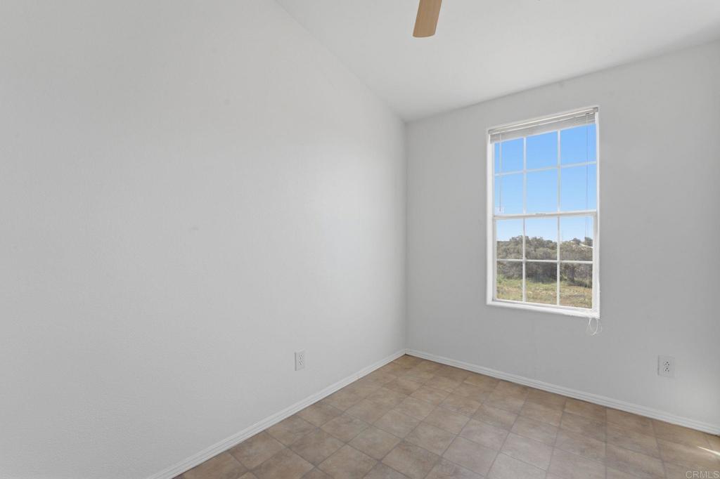 909 Tierra De Luna Road Boulevard, CA 91905 - Photo 36 of 74 an empty room with a window