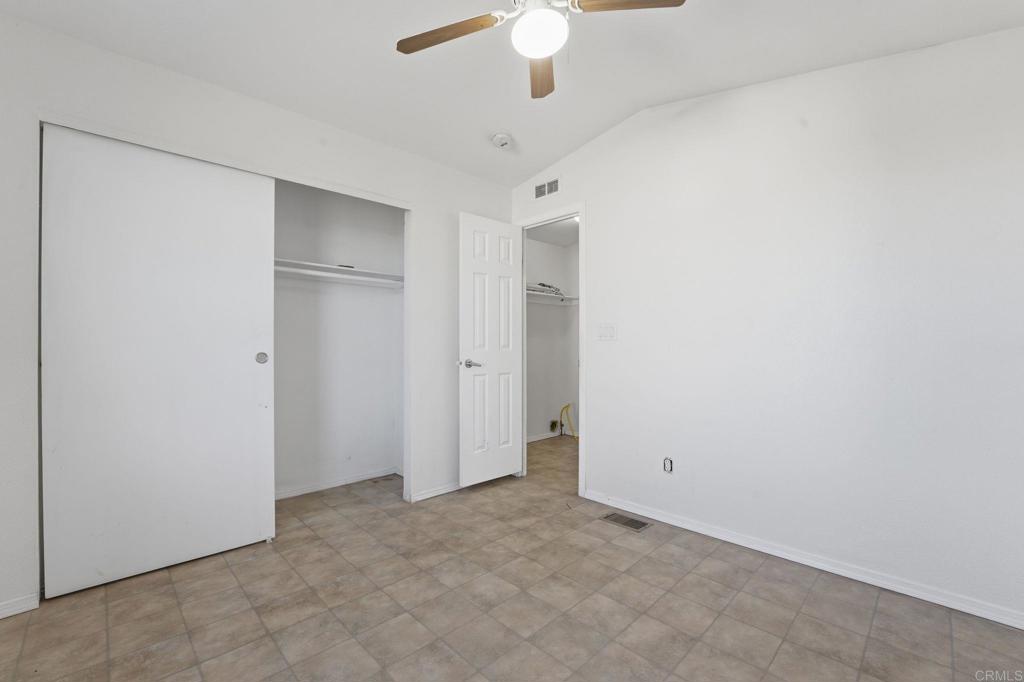 909 Tierra De Luna Road Boulevard, CA 91905 - Photo 39 of 74 a view of an empty room with a ceiling fan