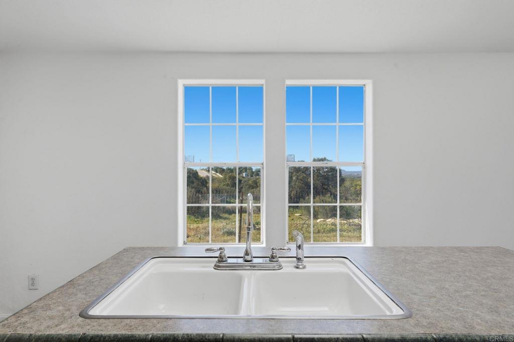 909 Tierra De Luna Road Boulevard, CA 91905 - Photo 10 of 74 a view of a sink and a window