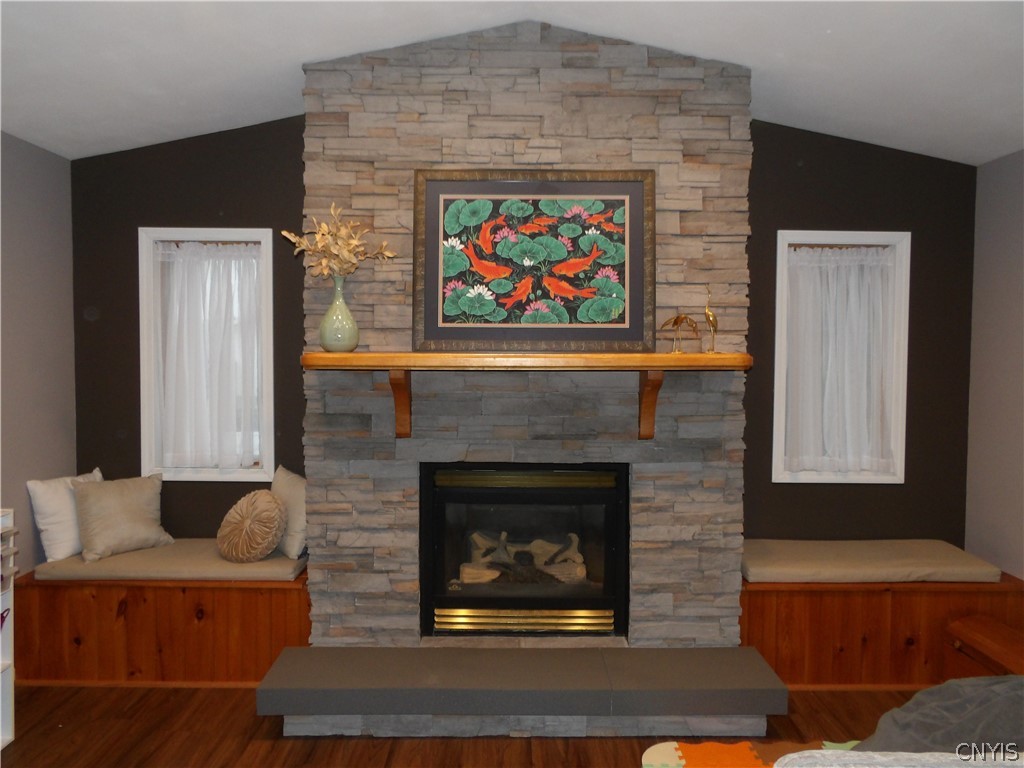 727 Bowling Green Road Cortlandville, NY 13045 - Photo 17 of 43 Gas fireplace with window seats