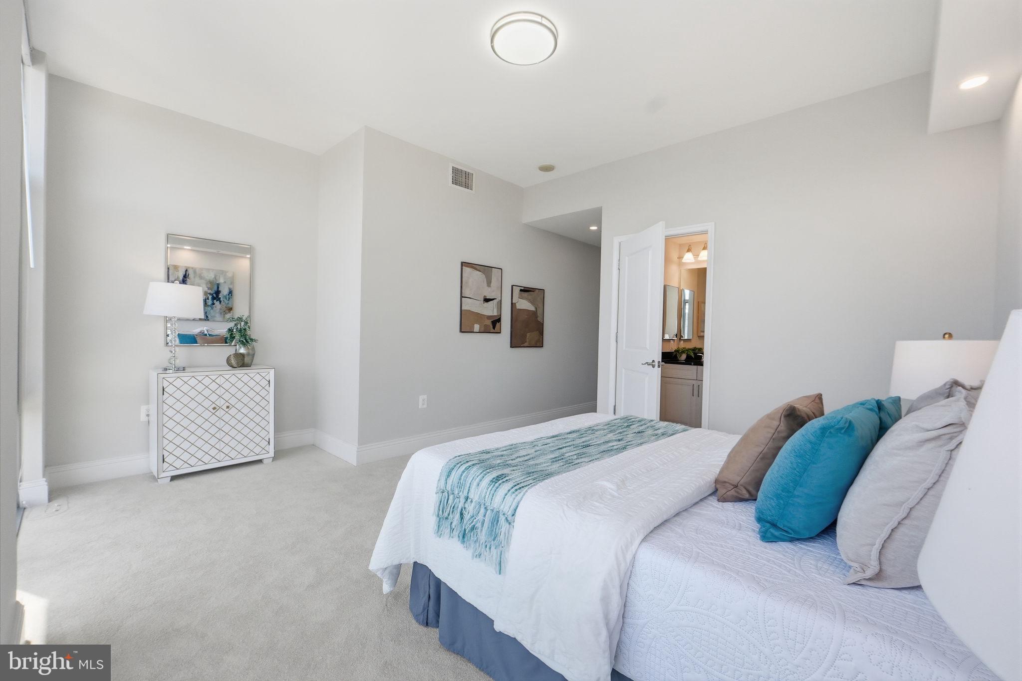 11990 Market Street, Unit 2103 Reston, VA 20190 - Photo 40 of 78 Bright and airy modern bedroom retreat.