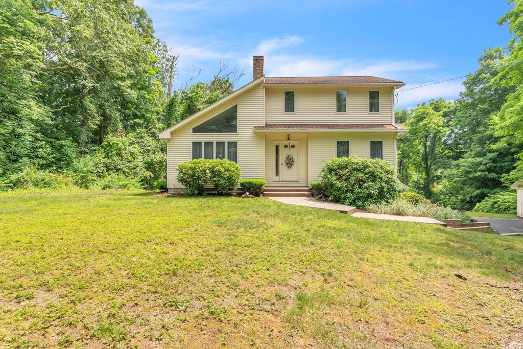 81 Munn Road Monson, MA 01057 - Photo 1 of 42 a view of a house with a garden