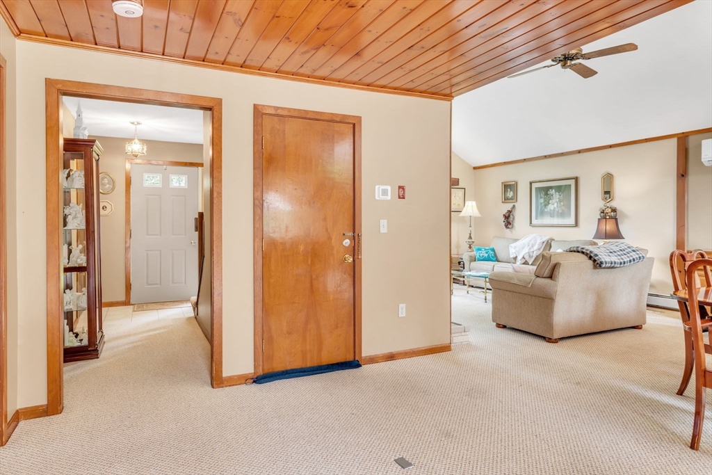 81 Munn Road Monson, MA 01057 - Photo 14 of 42 a view of a livingroom with furniture and a ceiling fan