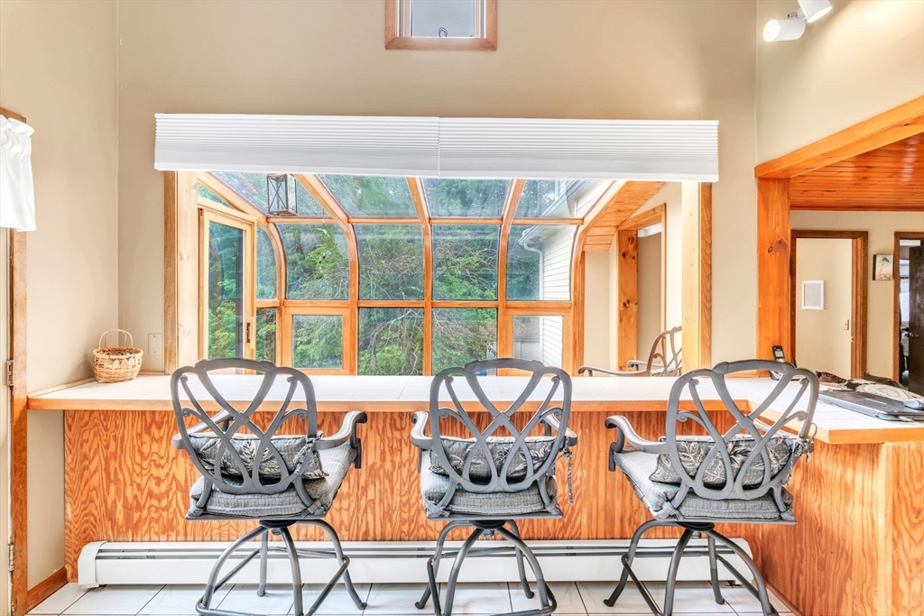 81 Munn Road Monson, MA 01057 - Photo 18 of 42 a dining room with furniture and large windows