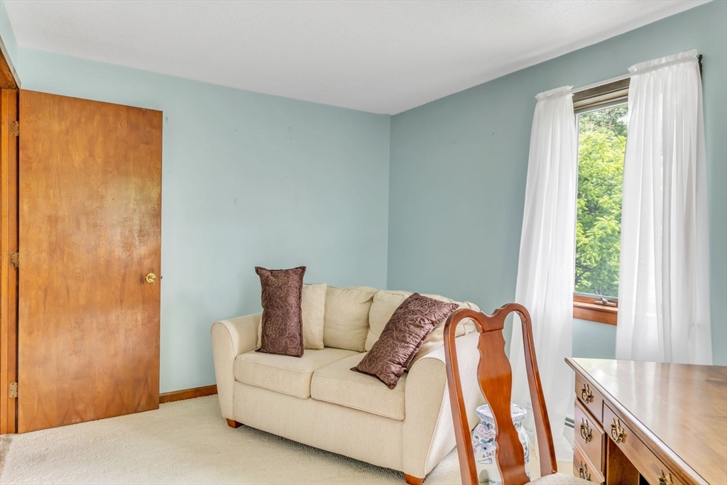 81 Munn Road Monson, MA 01057 - Photo 34 of 42 a living room with furniture and a large window