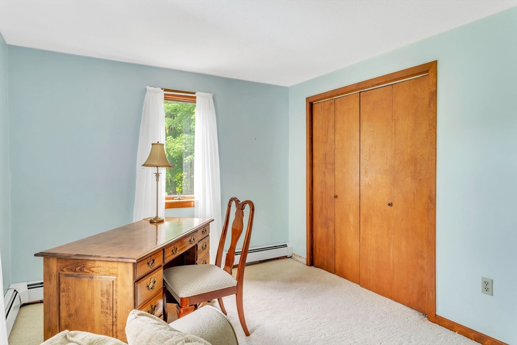 81 Munn Road Monson, MA 01057 - Photo 35 of 42 a view of a workspace with furniture and a window