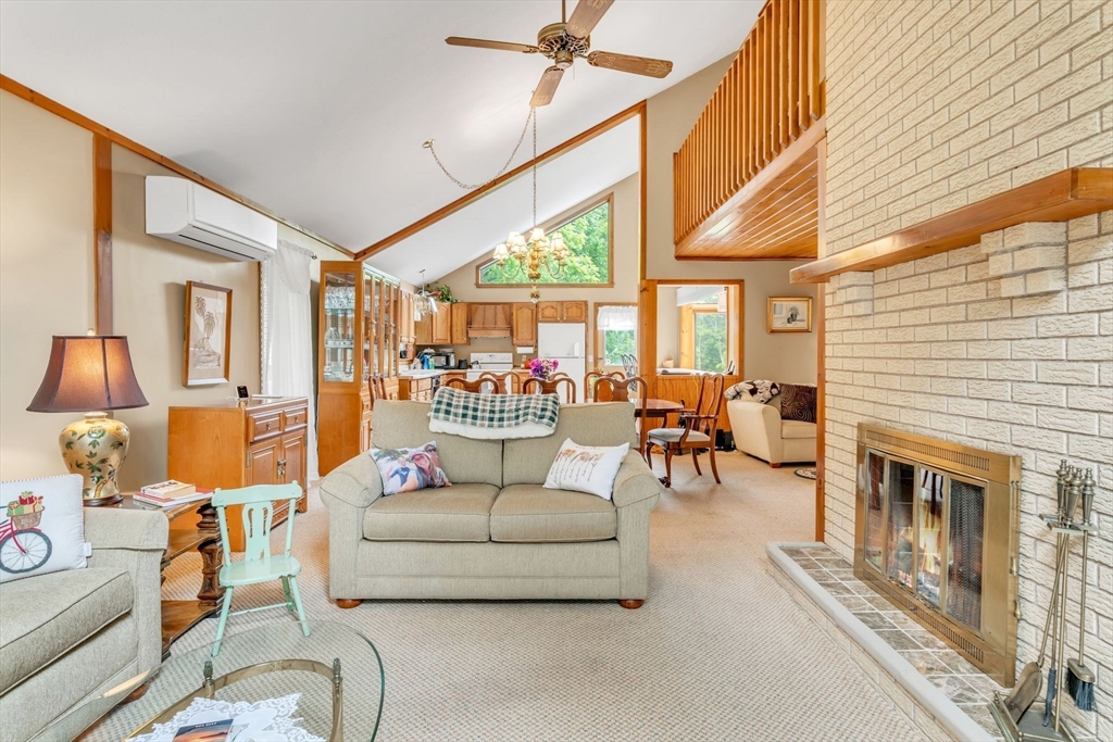 81 Munn Road Monson, MA 01057 - Photo 6 of 42 a living room with furniture and a fireplace