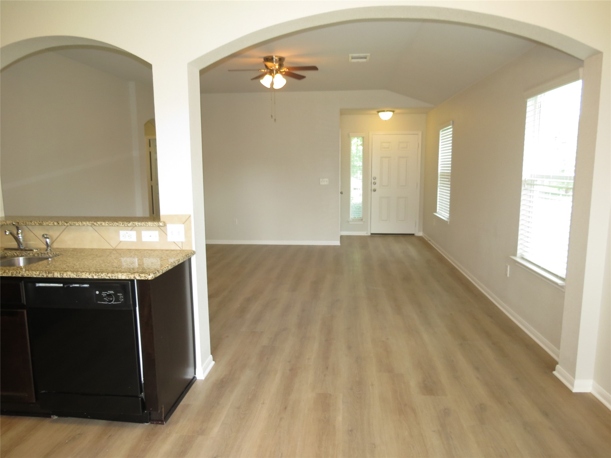375 Musgrav Kyle, TX 78640 - Photo 31 of 31 An open floorplan offers seamless flow from the kitchen to the sun-filled living area.