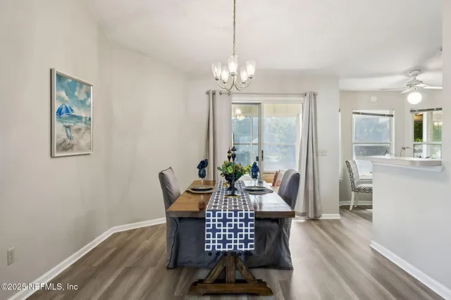 a workspace with furniture window and wooden floor