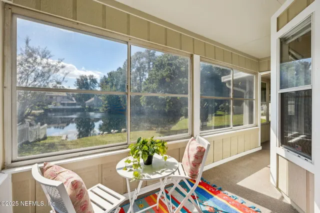 a view of a dining room with furniture wooden floor and a table